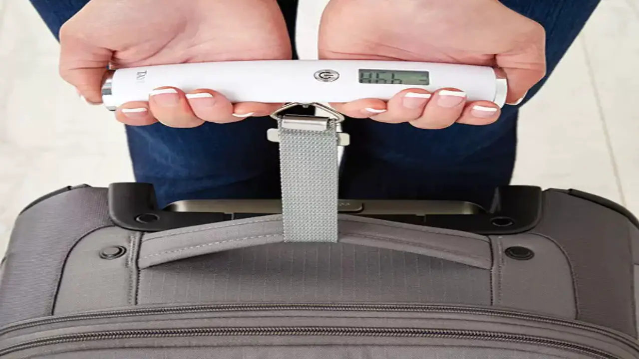 Weighing Luggage With A Handheld Scale